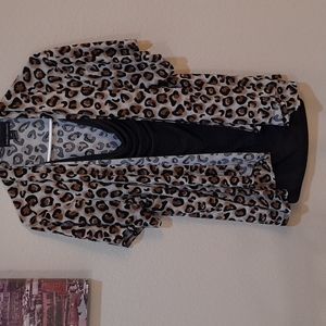 Ladies leopard print blouse with attached black shirt. 3X